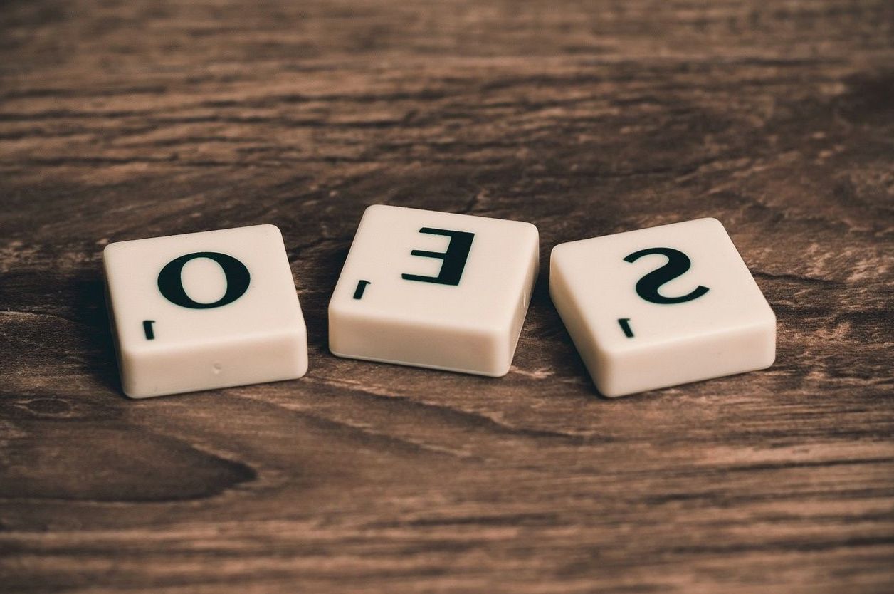 Wooden letter tiles spelling SEO